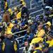 Michigan fans brave the weather during the annual alumni flag football game before spring practice at Michigan Stadium on Saturday, April 13, 2013. Melanie Maxwell I AnnArbor.com